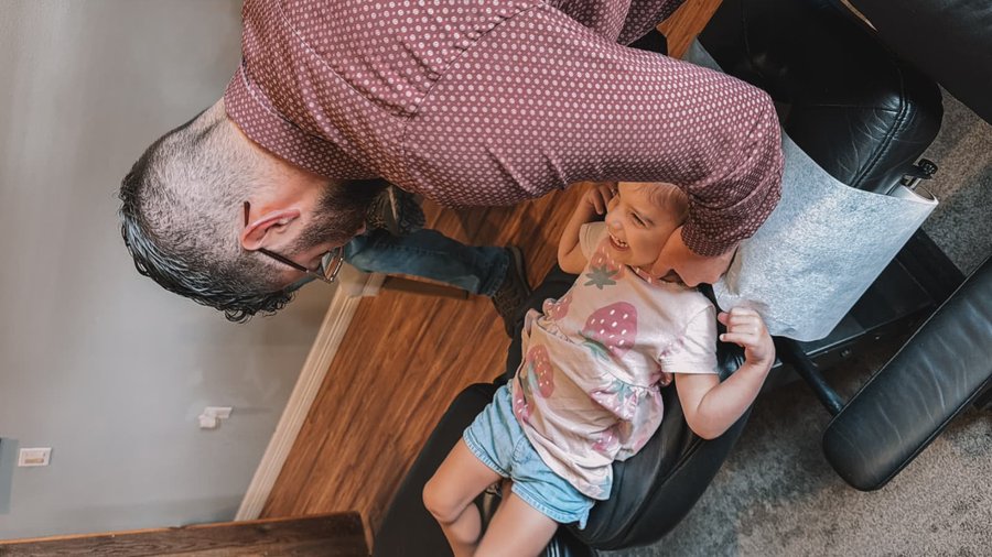 Dr. Langley adjusting a young patient